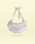 sac à main blanc forme demi-lune à froufrous motif mini citrons